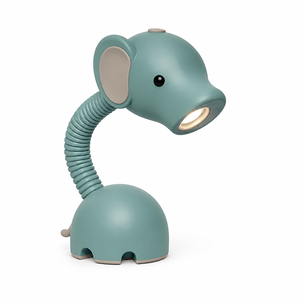Alien head shaped resin USB desk lamp glowing softly on a desk
