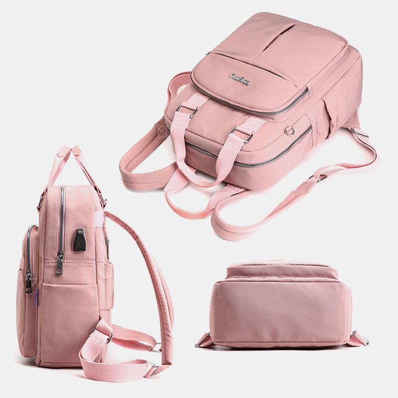 Travel Backpack in Water Resistant Oxford Fabric | Tablet Pocket, Phone Slot and Several Compartments | 28 by 36 by 12 cm