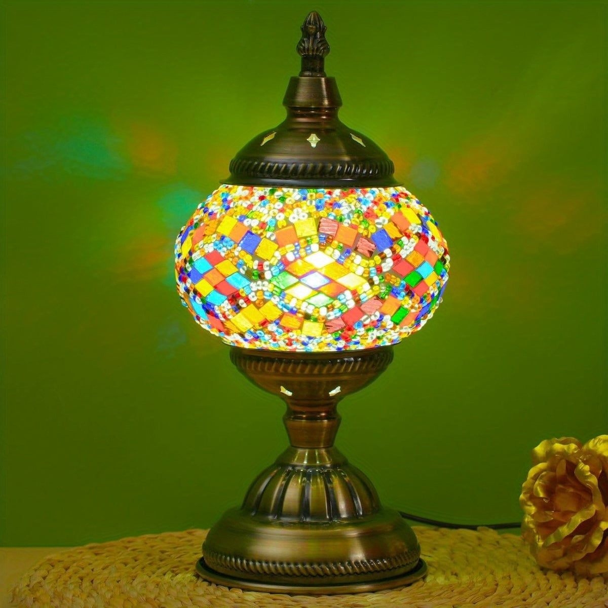 Mosaic pumpkin globe lamp on its metal base