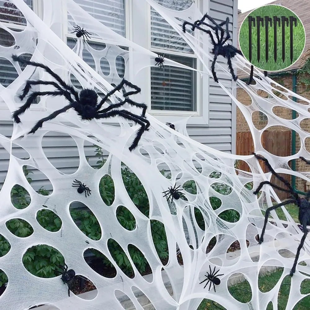 Large stretchy Halloween spider web decoration with ground stakes