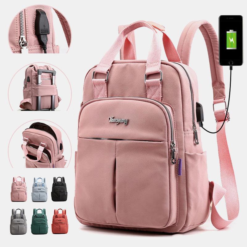Travel Backpack in Water Resistant Oxford Fabric | Tablet Pocket, Phone Slot and Several Compartments | 28 by 36 by 12 cm