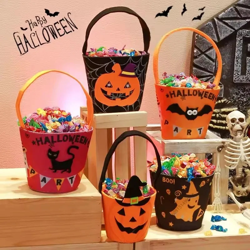 All four Halloween candy bucket designs shown together