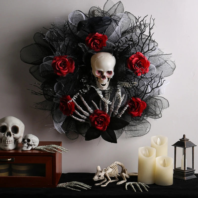 Halloween wreath of red roses, skulls, and black netting on a front door