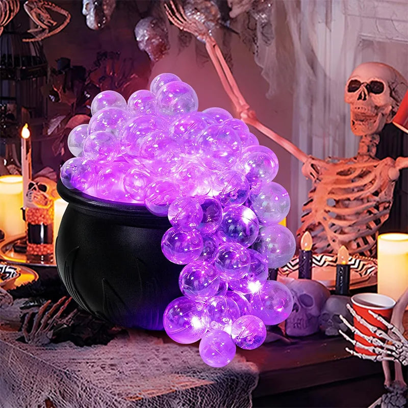 Black plastic Halloween cauldron candy bowl with glowing bubbling effect