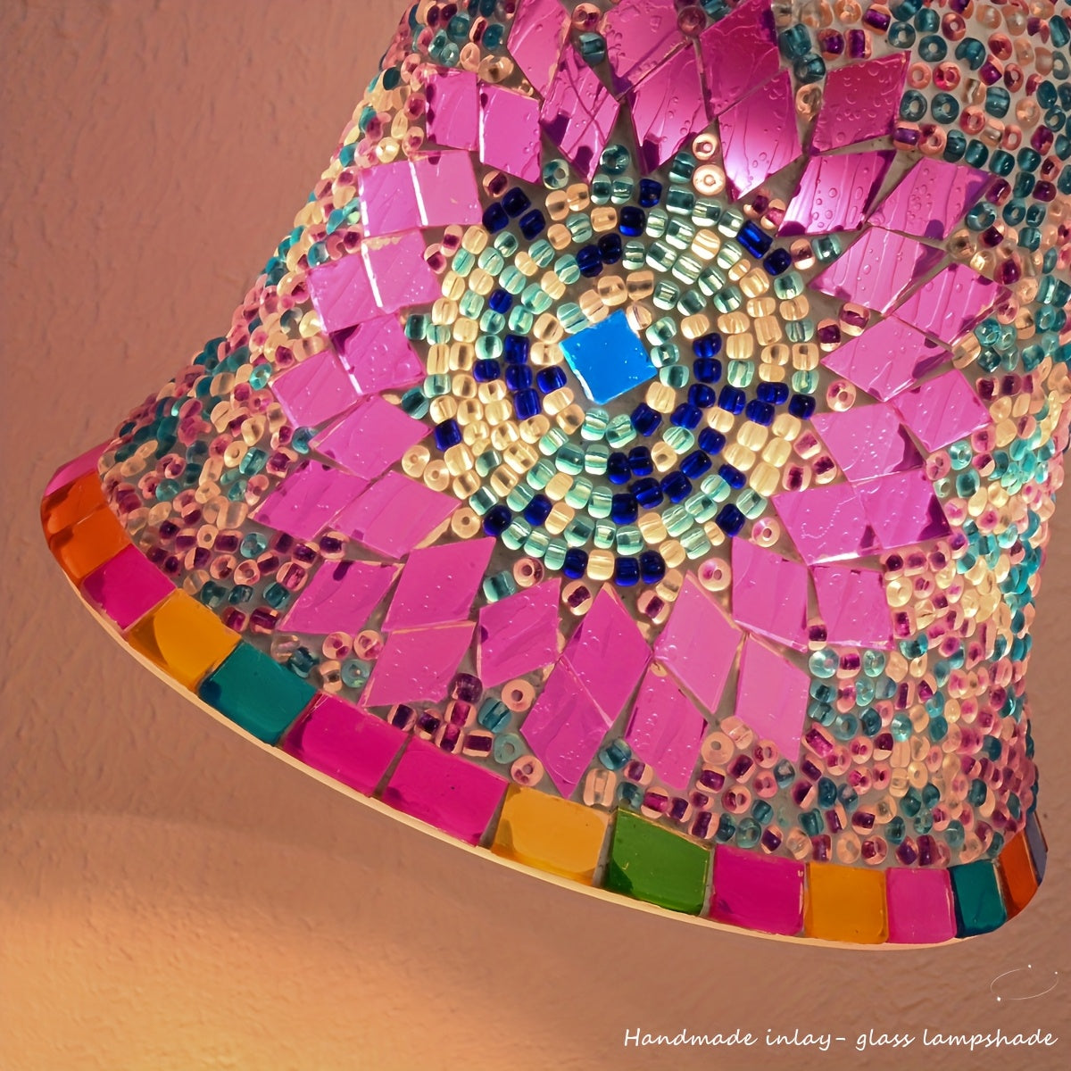 Turkish inspired mosaic table lamp lit in a dim room