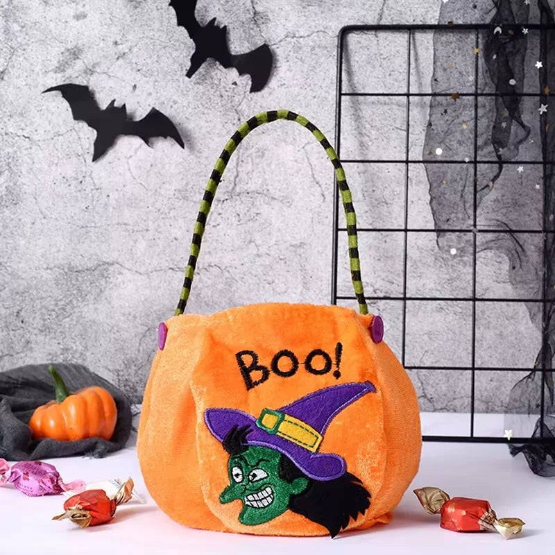 Pumpkin trick or treat bag shown open to reveal the brushed cloth lining