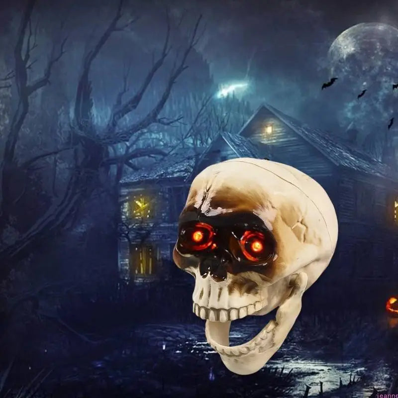 Close up of the animated skeleton head glowing red eyes
