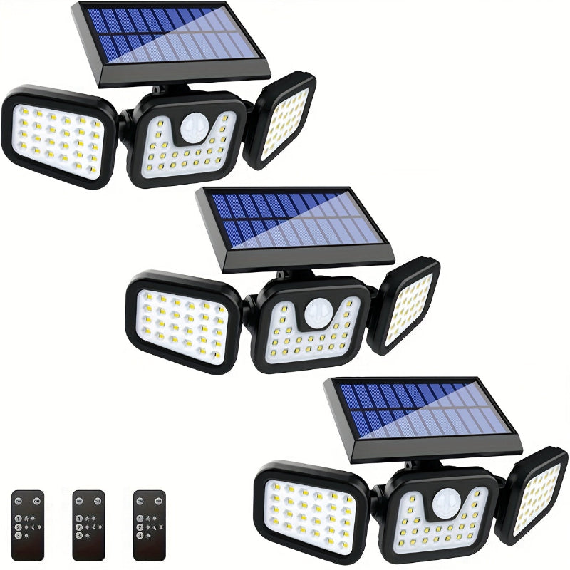 Motion sensor solar floodlight lighting a driveway at night