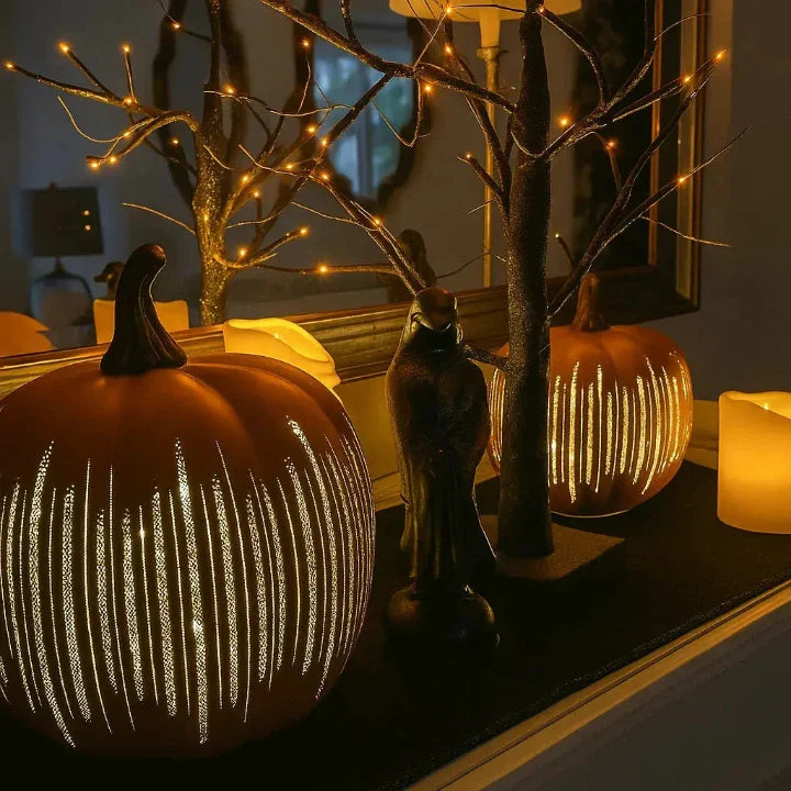 LED pumpkin lantern glowing on a table for Halloween