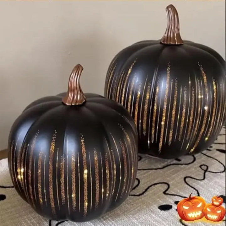 Sparkling pumpkin lantern lit on a windowsill for fall decor