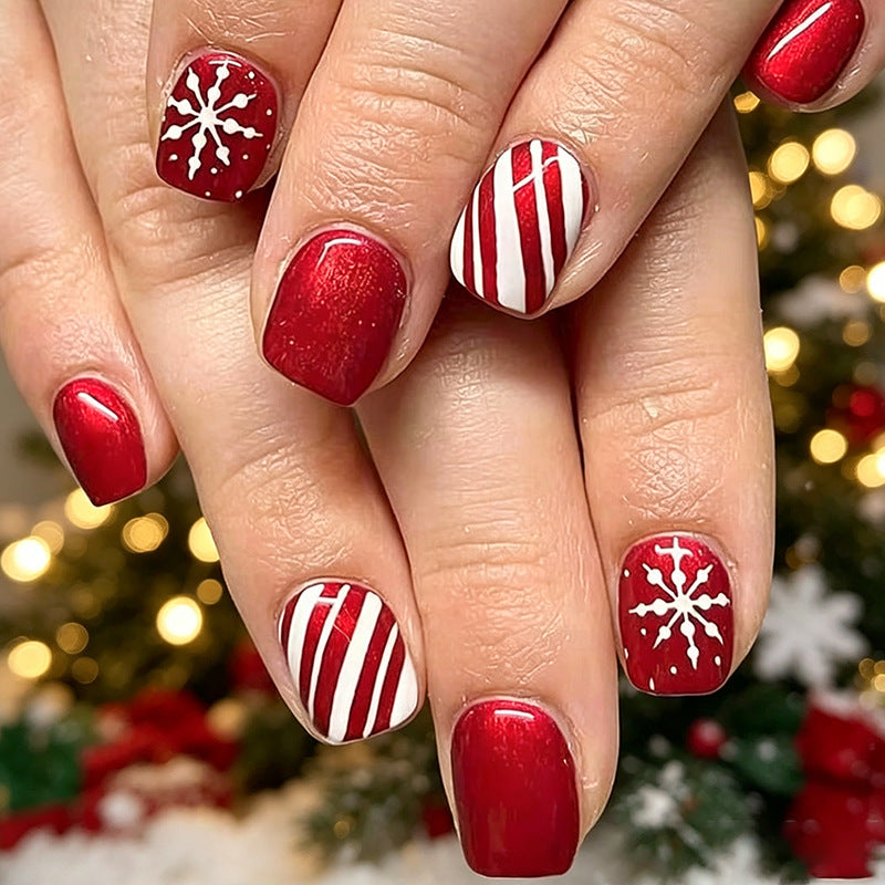 Festive Christmas Nails in Red with Candy Cane Stripes | Snowflake Accent Tips | Smooth Press-On Application