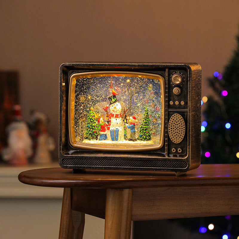 LED Lantern with a Santa Figurine Holding a Fir Tree | Shimmering Glitter Around the Scene | Warm Christmas Tabletop Light