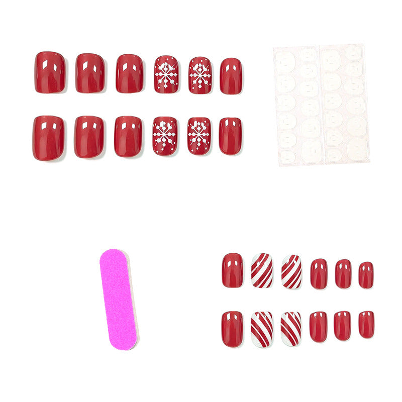 Festive Christmas Nails in Red with Candy Cane Stripes | Snowflake Accent Tips | Smooth Press-On Application