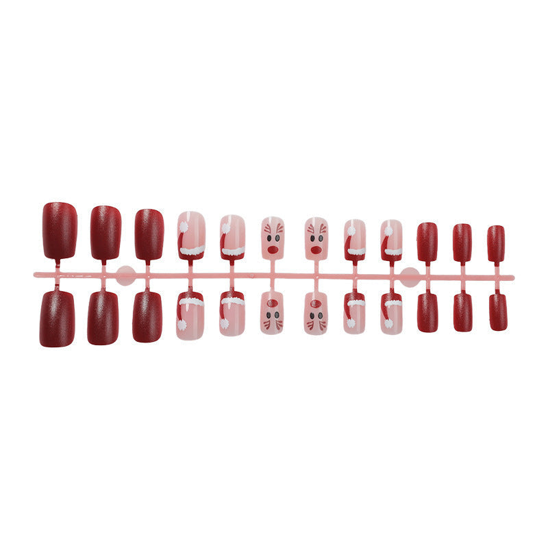 Reindeer and Santa Christmas Nails in Red and Pink | Snowflake Press On Nail Designs | Festive Winter Manicure