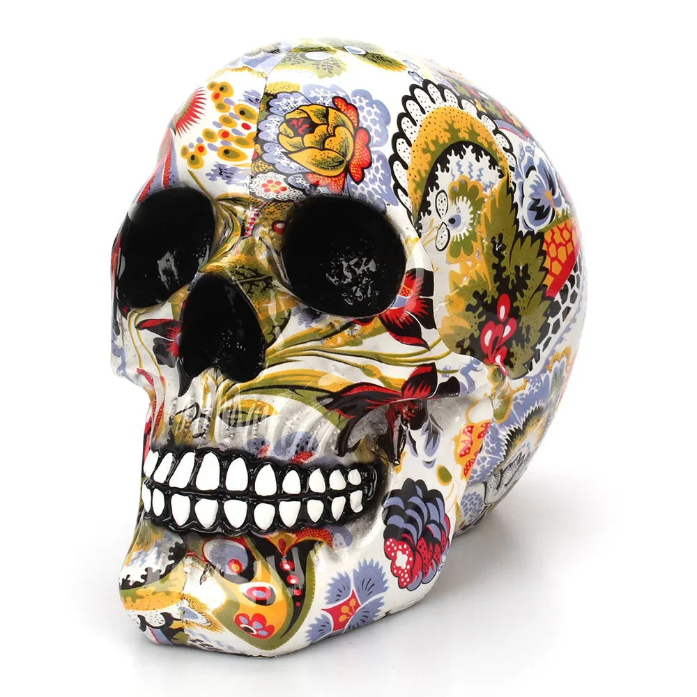 Hand-painted resin sugar skull with colorful Mexican floral pattern