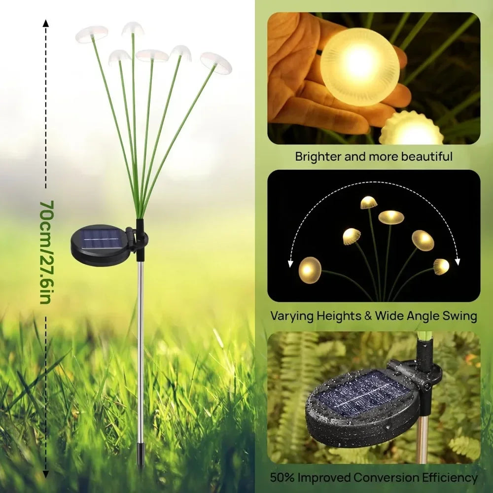 Solar mushroom lights staked into a flower bed at dusk
