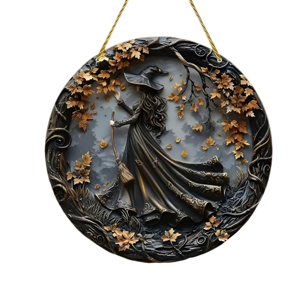 Circular witch door hanging with attached cord ready to hang