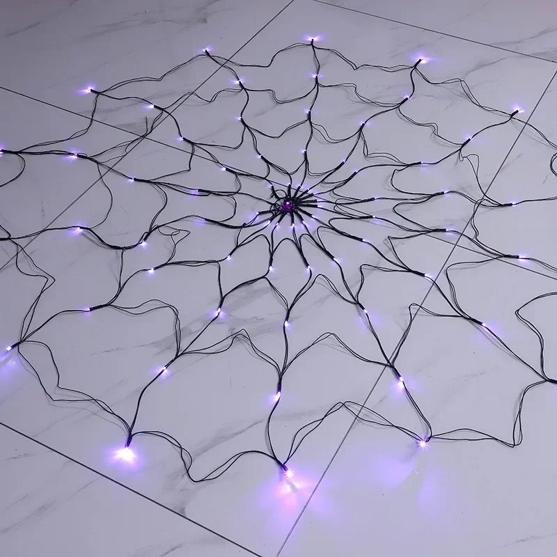 Halloween spider web light showing one of its eight light patterns