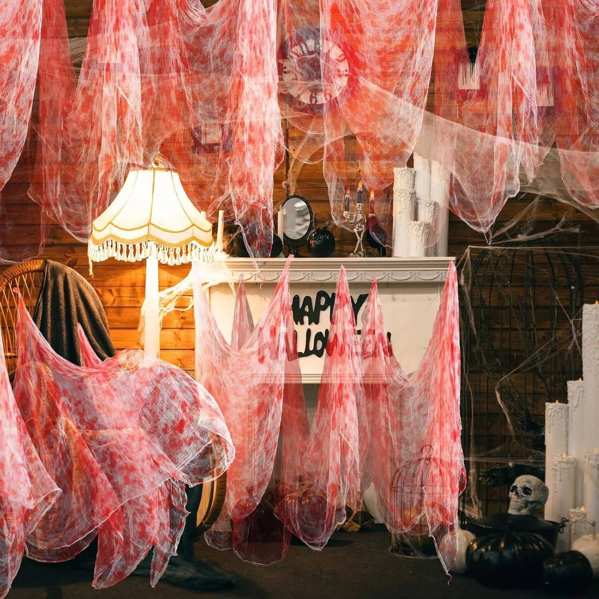 Tattered Halloween creepy cloth draped across a yard display