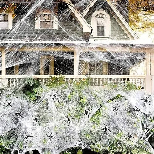 Nine plastic spiders included with the Halloween cobweb pack