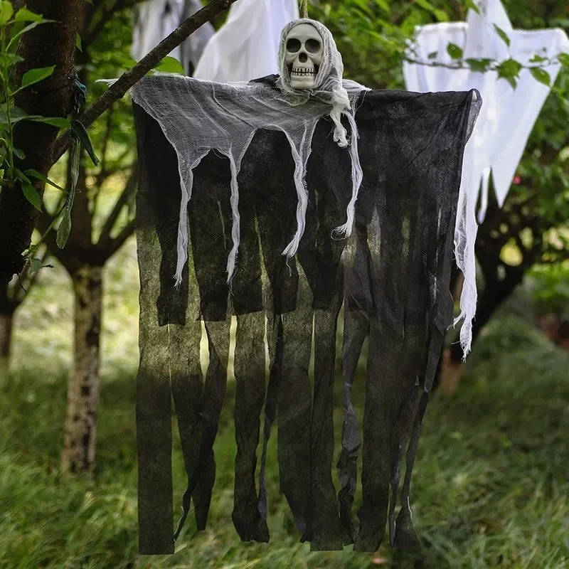 Hanging male ghost skull Halloween decoration with aged cloth shroud
