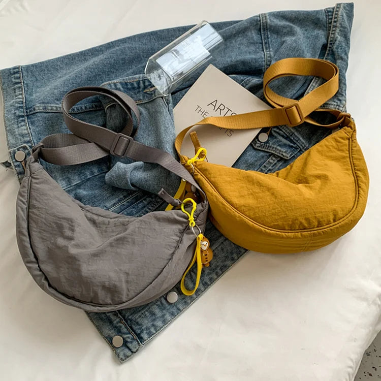 Lightweight Crossbody Bag with One Roomy Compartment | Dumpling Shape Shoulder Sling for Work, Shopping or a Day Out | Eight Colors