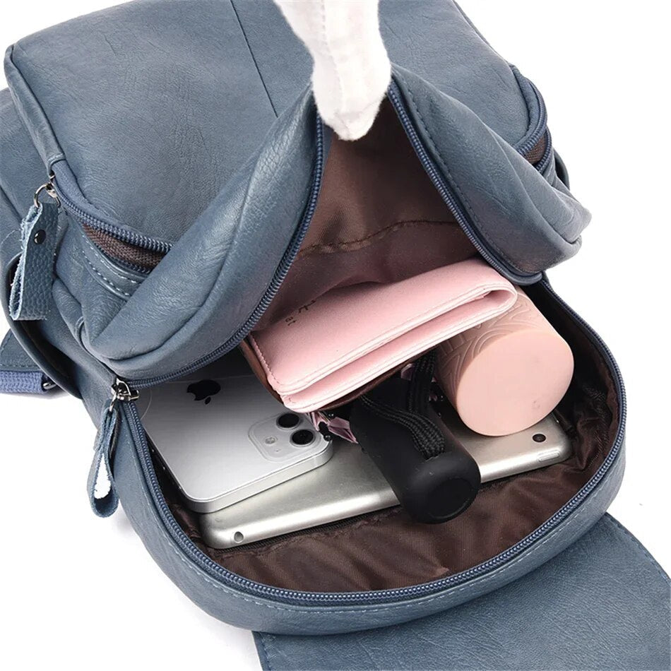 Travel Backpack for Women with a Flap Closure | Soft Leather Look Daypack with Zip Pockets and Adjustable Straps
