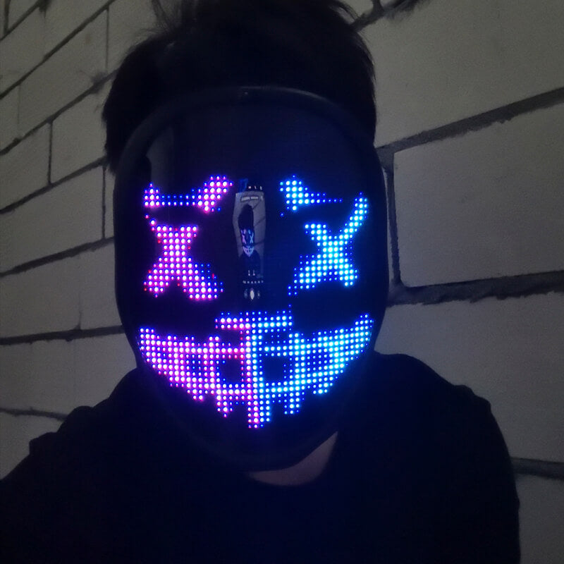 Halloween light up mask against a dark background