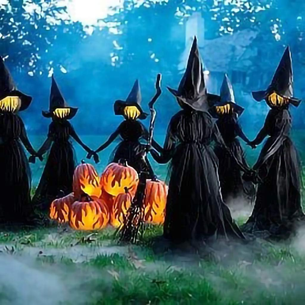 Illuminated witch decoration for a Halloween lawn display