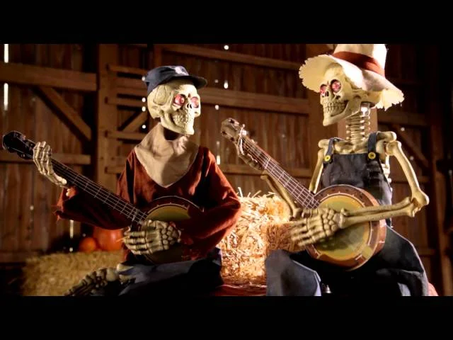 Skeleton banjo duo Halloween prop shown at full length