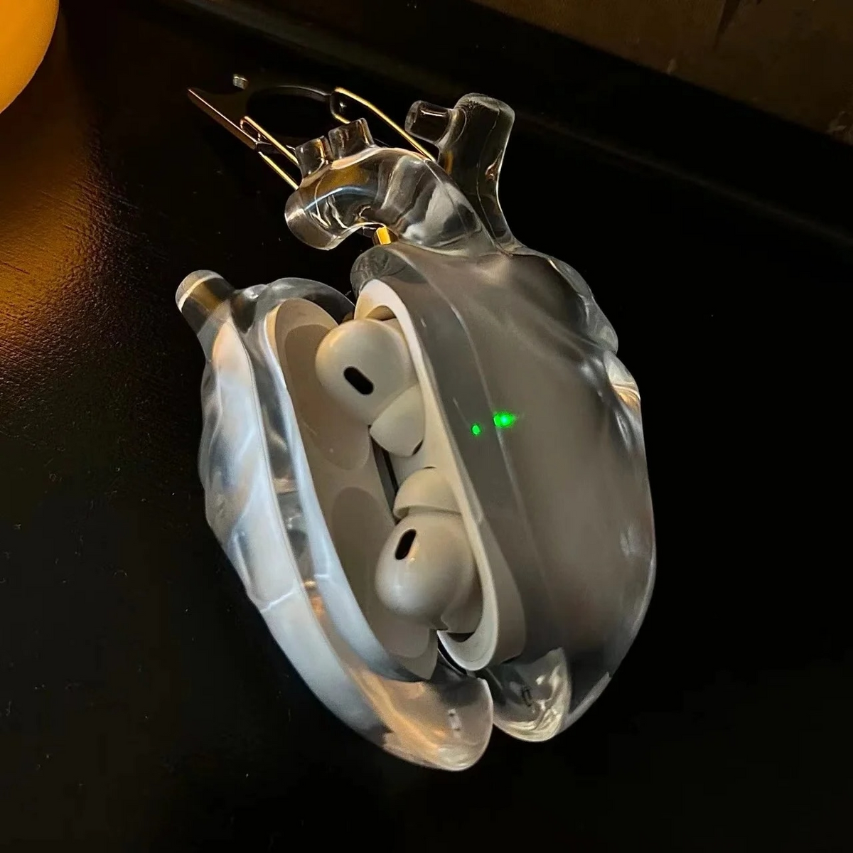 Heart design Halloween AirPods cover close-up
