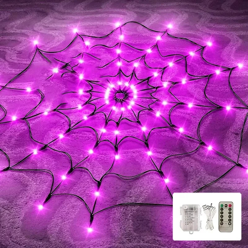 Halloween spider web decoration lit with purple LED lights