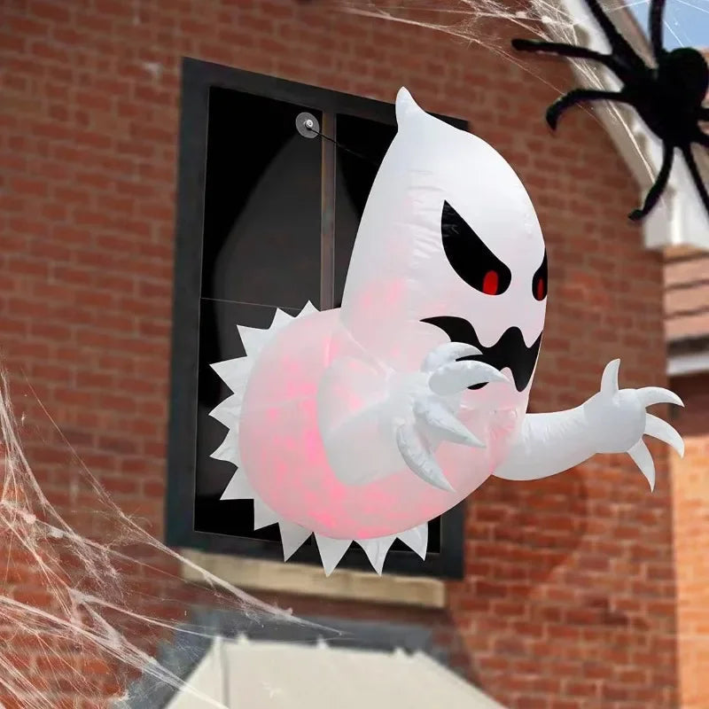 Inflatable Halloween ghost decoration glowing in a night yard display