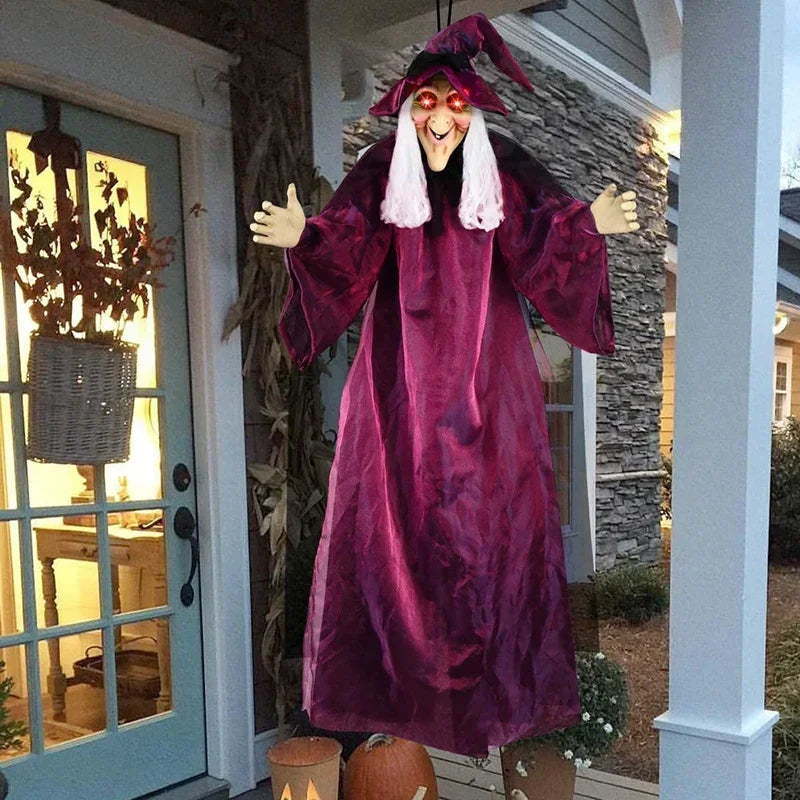 Life-size hanging Halloween witch decoration with glowing red eyes