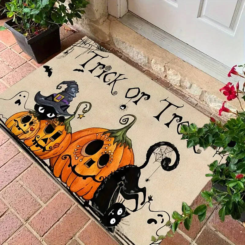 Welcome mat with Halloween artwork on a doorstep
