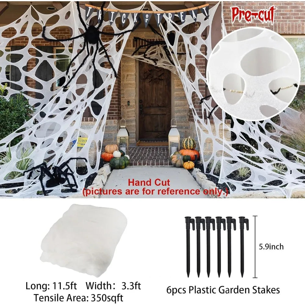 Cotton spider web stretched across a yard for a Halloween display