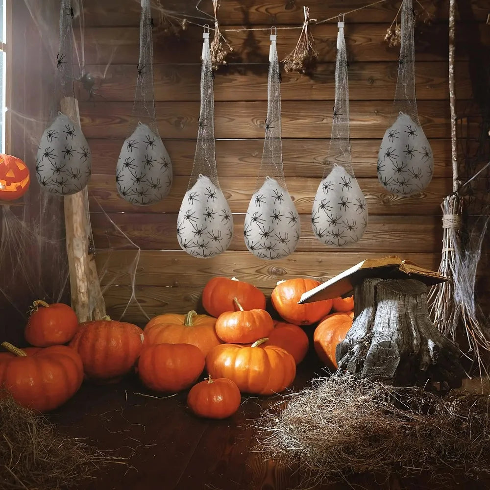 Webbed egg sac decoration covered with detailed crawling spiders