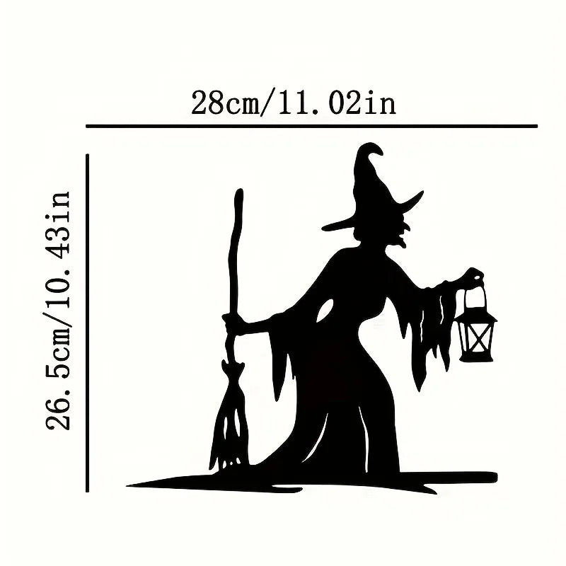 Witch garden stake pushed into soil beside a walkway