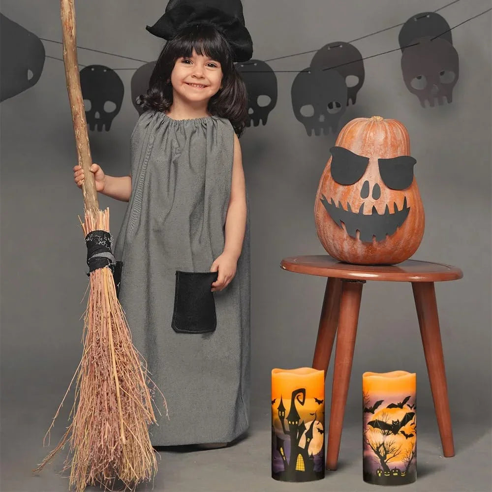 Flameless Halloween candles glowing with flickering LED flames