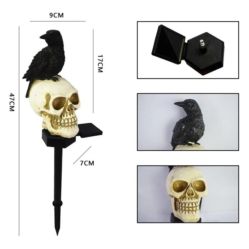 Skeleton head solar light staked along a garden pathway at night