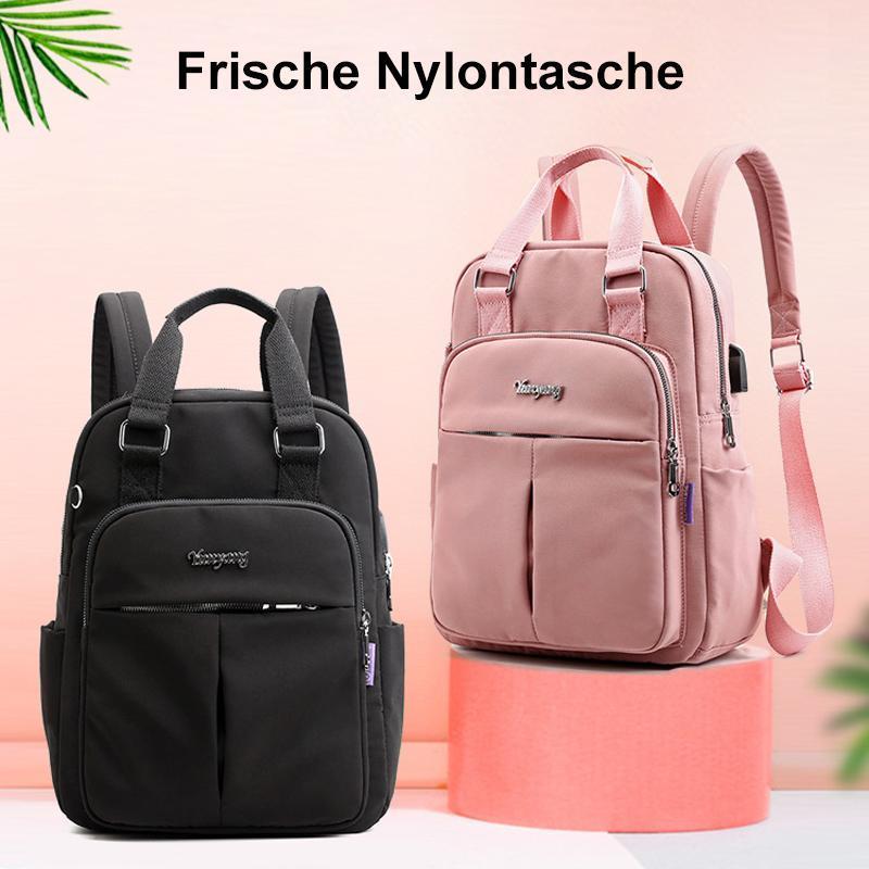 Travel Backpack in Water Resistant Oxford Fabric | Tablet Pocket, Phone Slot and Several Compartments | 28 by 36 by 12 cm