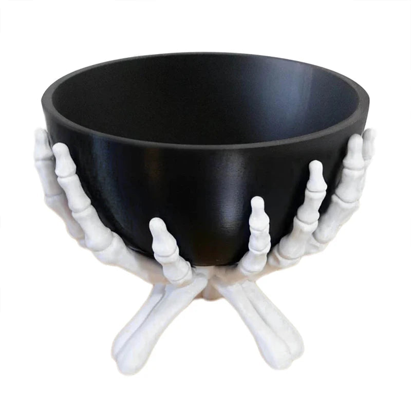 Skeleton hand candy bowl with the removable serving dish lifted out