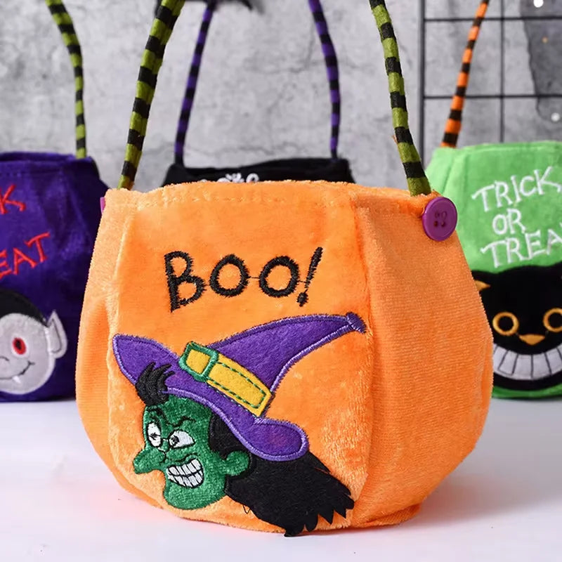 Child carrying the pumpkin treat bag while collecting Halloween candy