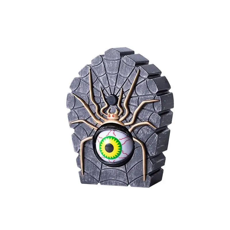 Close view of the spider doorbell button and adhesive backing