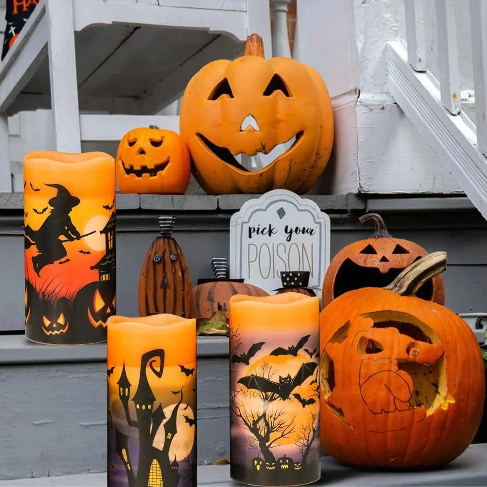 Set of three flameless Halloween candles with witch, bat and castle designs
