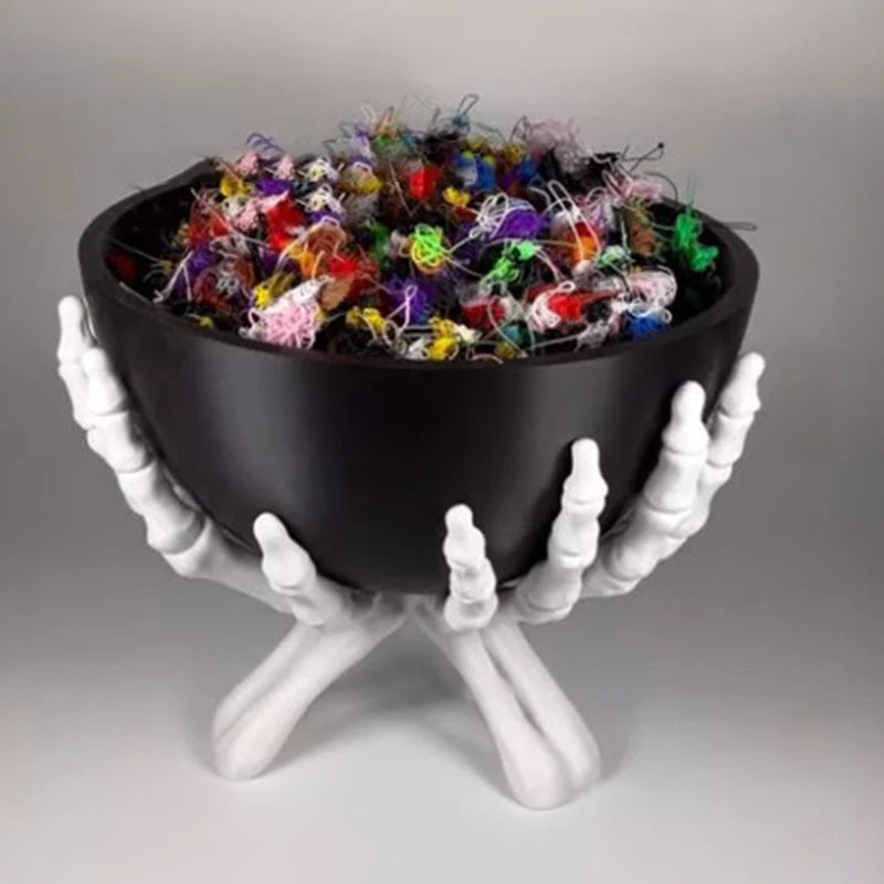 Close view of the bony finger detailing on the plastic candy dish