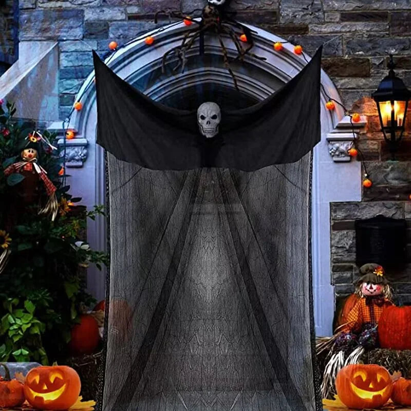 Hanging ghost Halloween decoration with skeleton mask and glowing red eyes