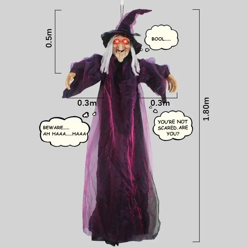 Halloween witch decoration hung outdoors as part of a yard display