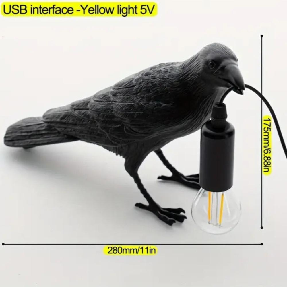 Halloween crow lamp viewed from the side showing claw detail
