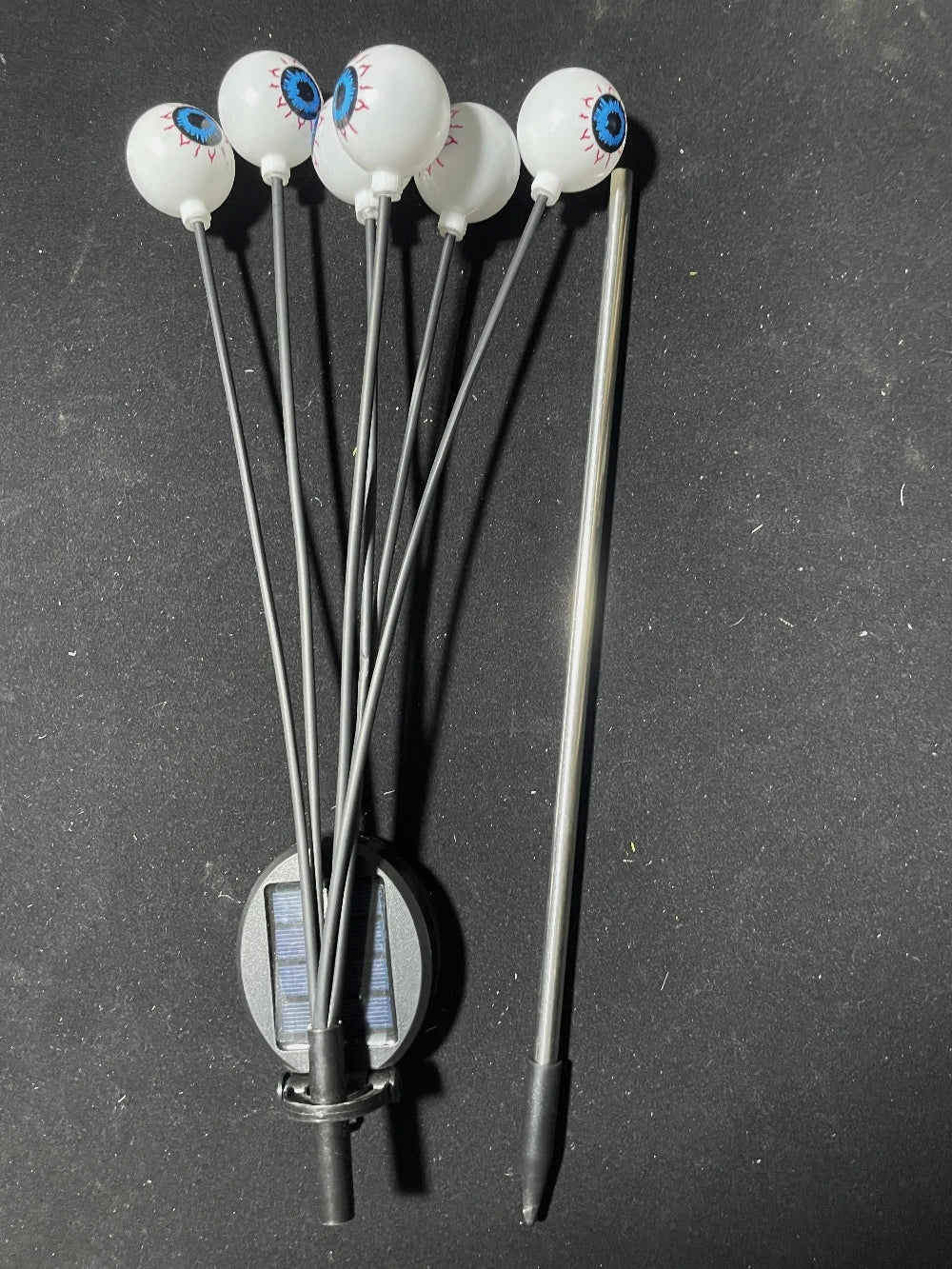 Set of six Halloween eyeball solar lights shown together